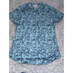 NineDaily women's sz. L Blue/ Aqua Design zip front top. New w/out tags.